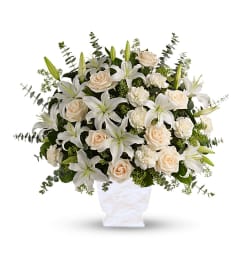 Serene White Tribute. An arrangement by Tallevast Florist.