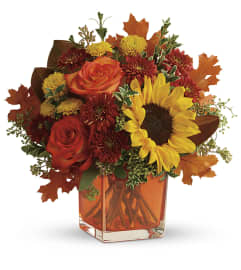Hello Autumn Bouquet (Teleflora). An arrangement by North Liberty Flower Shop.