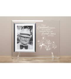 Cardinals Appear Glass Frame. An arrangement by The Flower Hut.