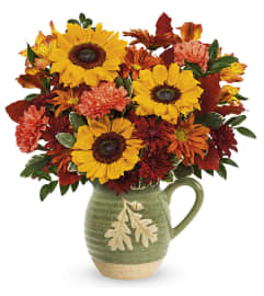 Autumn Acorn Pitcher by Teleflora. An arrangement by Sueppel's Flowers.