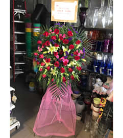Stunning Standing Grand Opening Arrangement. An arrangement by Flamingo Floral and Gifts.
