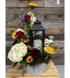 Sunrise Lantern. An arrangement by The Farm and Floral Market.