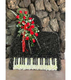 Piano Tribute. An arrangement by Flowers By Maria.