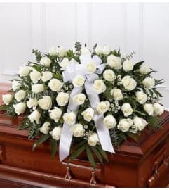 White rose casketspray. An arrangement by Win's Flowers.