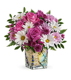 ELEGANT VINTAGE BUTTERFLY BOUQUET. An arrangement by Elegant Florist.