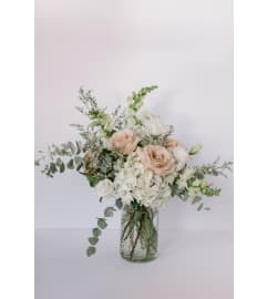 Latte. An arrangement by Edna Miller Flowers and Gifts Inc..