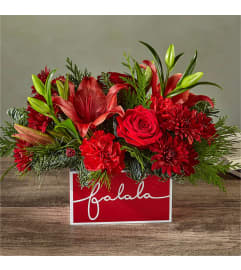 Yuletide Carol Bouquet. An arrangement by Conny's Flower Shop.