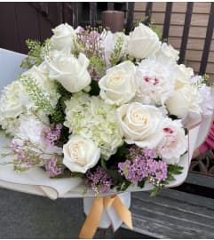 Glamorous Wrapped Bouquet. An arrangement by Violeta's Flower Shop. Glamorous Wrapped Bouquet. An arrangement by Violeta's Flower Shop.