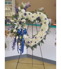 HEART WREATH BLUE AND WHITE. An arrangement by Unique N Pretty Florist.