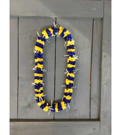 Blue and Yellow Ribbon With Beads lei. An arrangement by Royal Louis Florist.