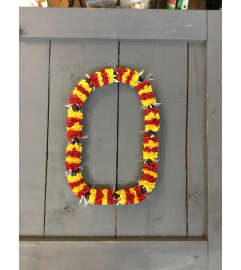 Yellow Red ribbon with beads lei. An arrangement by Royal Louis Florist.
