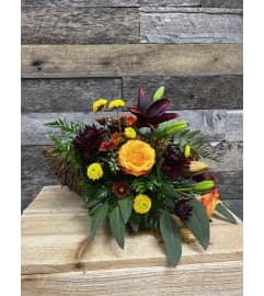 Full of Fall Cornucopia. An arrangement by The Farm and Floral Market.