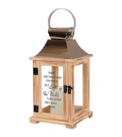 LIGHT UP THE WORLD MEMORIAL LANTERN. An arrangement by J.D. Ballantine's Flowers and Gifts.