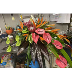 Exotic casket spray bouquet. An arrangement by Helene Fleuriste.