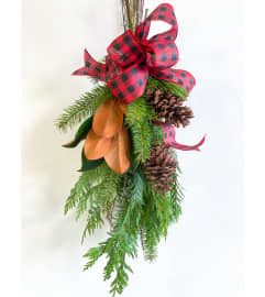 Warm Welcome Holiday Swag. An arrangement by Mayfield Flowers. Warm Welcome Holiday Swag. An arrangement by Mayfield Flowers.