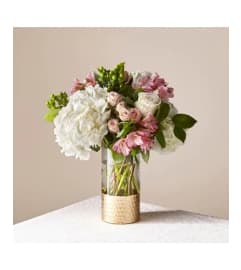 ATC Rose all day. An arrangement by A Touch of Class Flowers and Drapery.