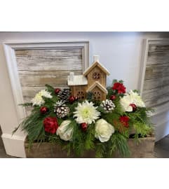 Cedar cabin ***lights up*** Christmas. An arrangement by Flowers By Gerry.
