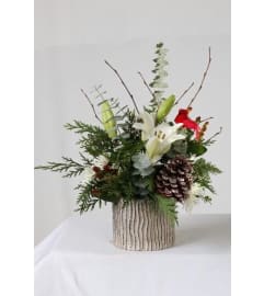 MC12. An arrangement by Win's Flowers.