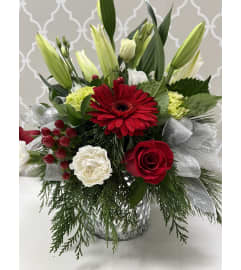 Silver Mist Holiday Bouquet. An arrangement by Shalimar Flower Shop. Silver Mist Holiday Bouquet. An arrangement by Shalimar Flower Shop.