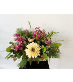 Cottage Core Christmas. An arrangement by Osborne Florist.