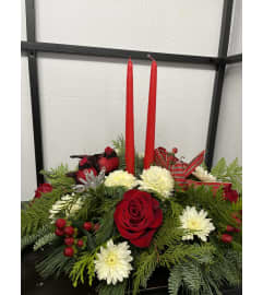 Centre peace 2 candles. An arrangement by Helene Fleuriste.