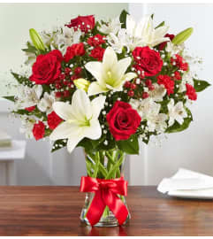 Fields of Europe Christmas DX. An arrangement by Flowers of Jacksonville.