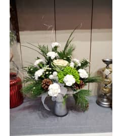 Snow Delightful. An arrangement by Avenue Florist.