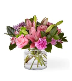 ATC Mariposa. An arrangement by A Touch of Class Flowers and Drapery.