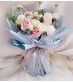 BD6. An arrangement by Win's Flowers.