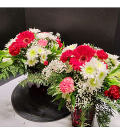 Christmas Mini Vase. An arrangement by Pandora's Posies. Christmas Mini Vase. An arrangement by Pandora's Posies.