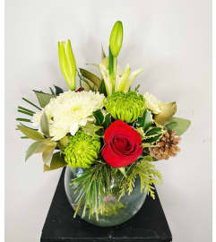 Holidays Wishes. An arrangement by Osborne Florist. Holidays Wishes. An arrangement by Osborne Florist.