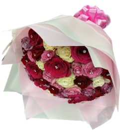 Pastel Color Roses. An arrangement by Elegant Florist.