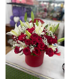 Red and White Cheers. An arrangement by Flower World and Gifts.