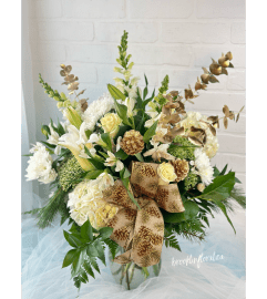 Elegance with a touch of Gold. An arrangement by Brooklin Floral and Garden Shoppe Inc.. Elegance with a touch of Gold. An arrangement by Brooklin Floral and Garden Shoppe Inc..