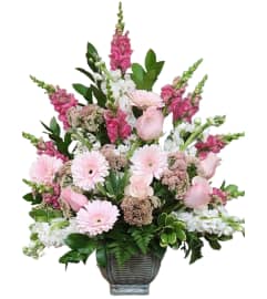 ELEGANT FAREWELL. An arrangement by Azi Flowers.