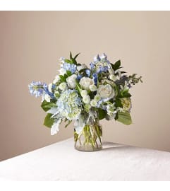 Blue Skies For Days. An arrangement by L and J Blooms. Blue Skies For Days. An arrangement by L and J Blooms.