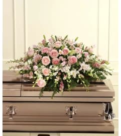 PINK PASSION PASKET SPRAY. An arrangement by Brasco Florist.