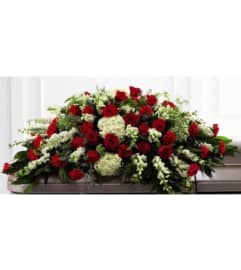 CASKET SPRAY MASCULINE. An arrangement by Brasco Florist.