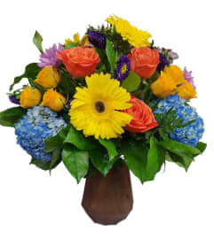 LOVELY WISHES. An arrangement by Azi Flowers.