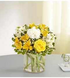 Yellow and White Delight All around Bouquet. An arrangement by Flowers of Jacksonville.