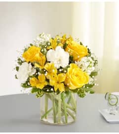Yellow and White Delight All around Bouquet. An arrangement by Flowers of Jacksonville.