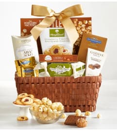 GOODIES AND MORE GIFT BASKET. An arrangement by Last Minute Gifts and Flowers. GOODIES AND MORE GIFT BASKET. An arrangement by Last Minute Gifts and Flowers.