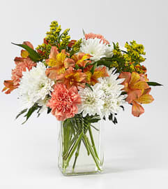 FTD Sweet Peach. An arrangement by Balloon Bouquets Plus. FTD Sweet Peach. An arrangement by Balloon Bouquets Plus.