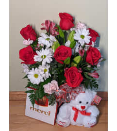 The Love Package. An arrangement by Maezy's Petals.