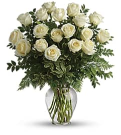 JOY OF ROSES. An arrangement by Tallevast Florist.