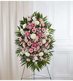 The warmth Pink and White Standing Spray. An arrangement by Elegant Florist.