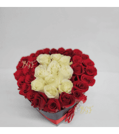 Joyfull Heart In Red. An arrangement by Brickell Exclusive Blooms.