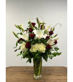 My Romance. An arrangement by Susana's Flowers.