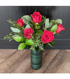 DELUXE RED ROSES (HALF DOZEN TO 1.5 DOZEN). An arrangement by Petals and Co..