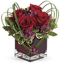 With Sweet Thoughts. An arrangement by Palmetto Gardens Florist.